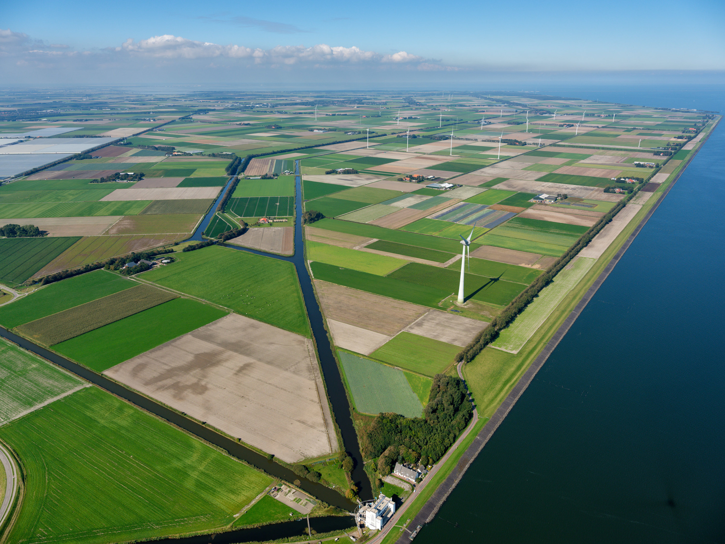 Aerial photo of Wieringermeer with windmills